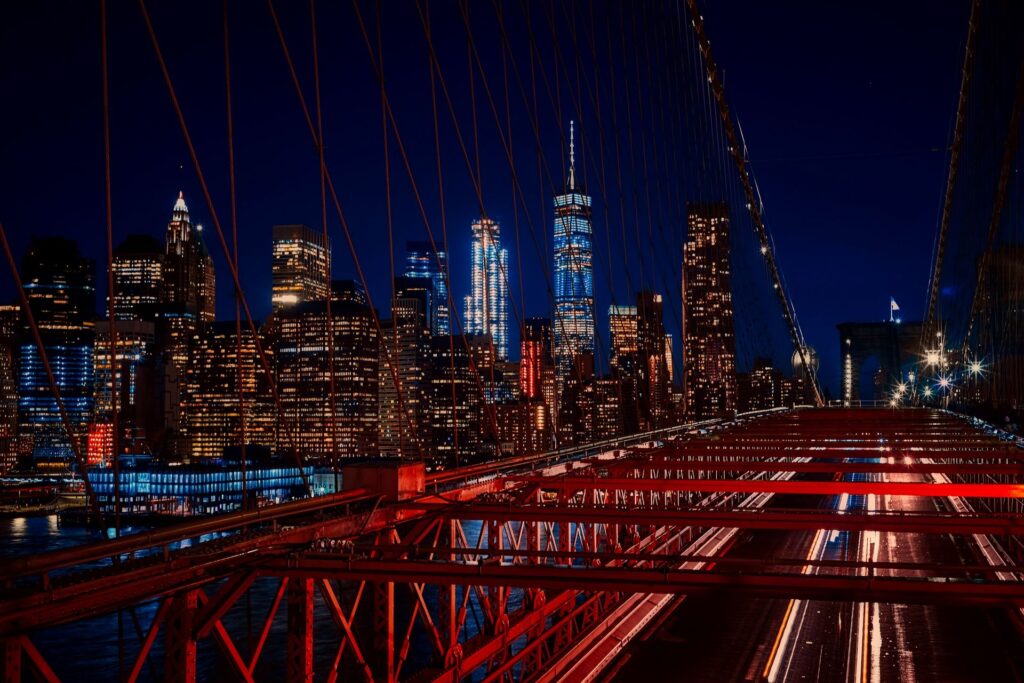 New York City skyline and Brooklyn Bridge at night