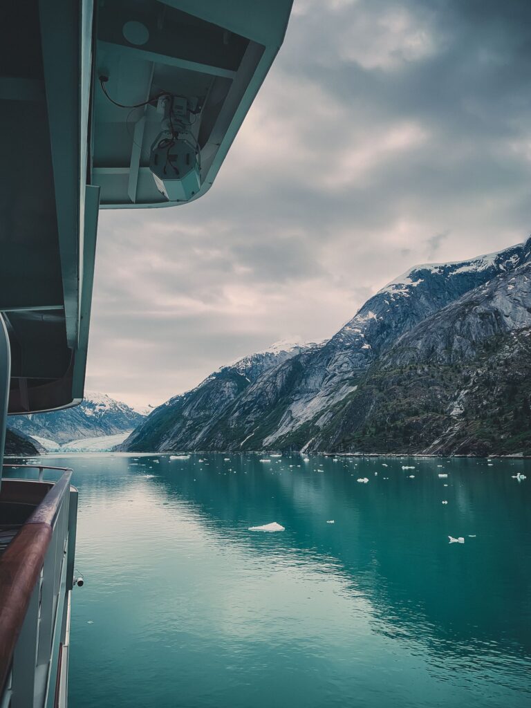 Alaska cruise ship sailing past a glacier fjord